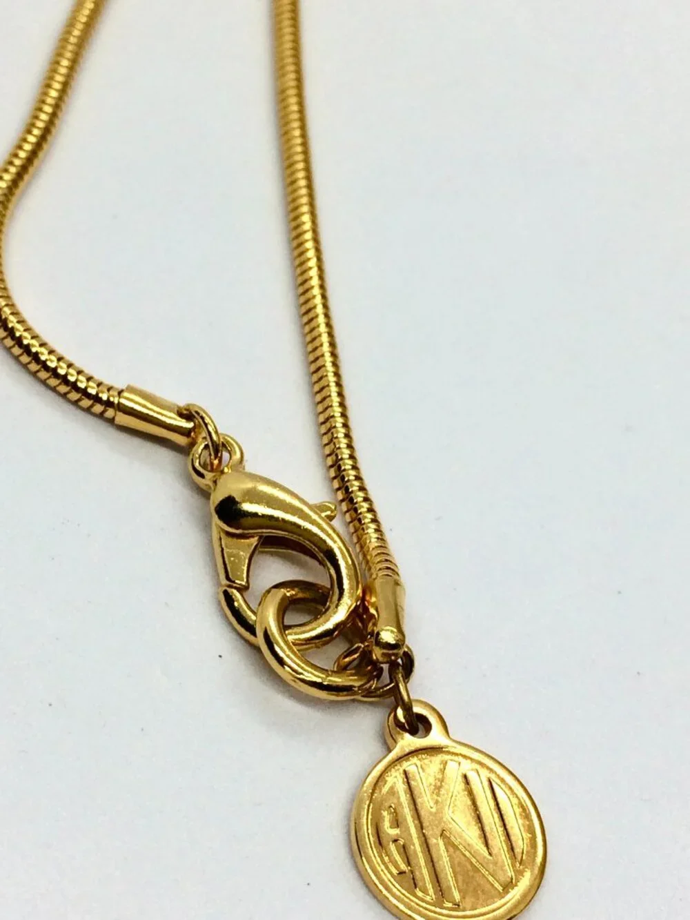 VINTAGE ANNE KLEIN Necklace Gold Tone XO Pendant Long Snake Chain